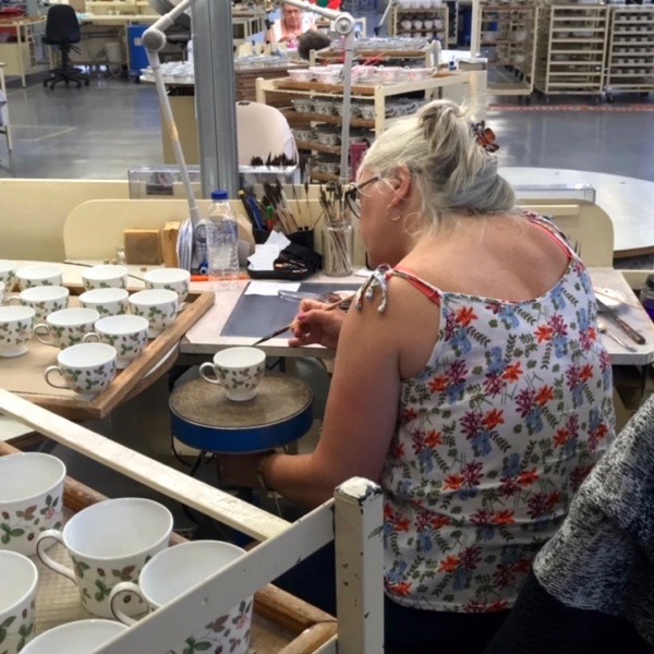 Adding the gold lines on the Wedgwood factory tour